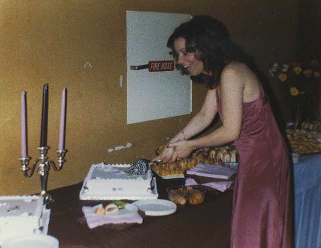 Maxine cutting her 21st cake